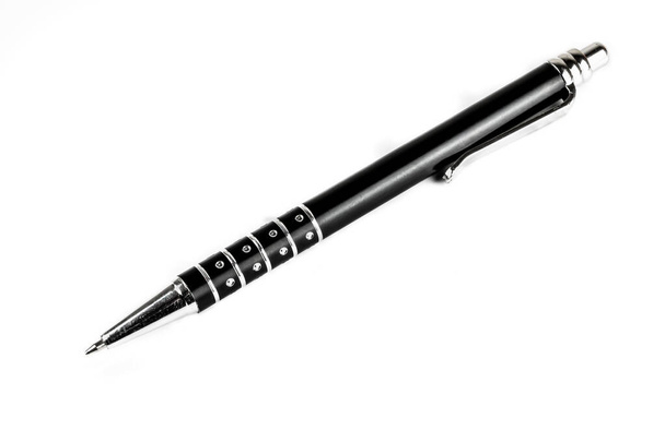 black decorated ballpoint pen on a white background - Photo, Image