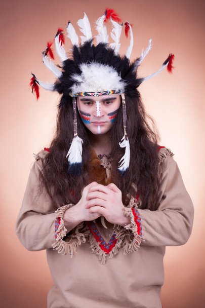 Native american men on brown background - Valokuva, kuva
