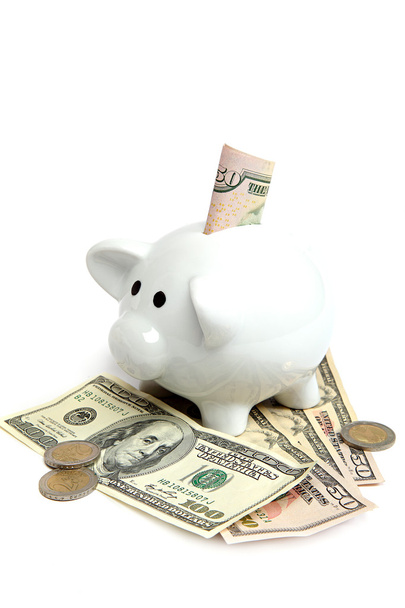 Piggy bank with banknotes on a white background. - 写真・画像