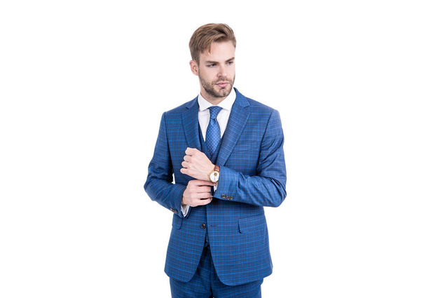 Young realtor fix sleeve button wearing fashion navy suit in business formal style, outfitting. - Valokuva, kuva