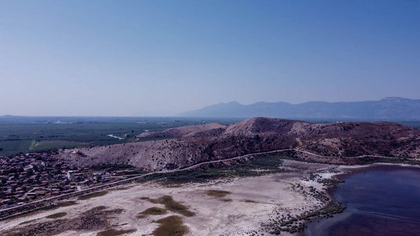 a very good looking horizontal landscape drone shoot with vivid colors - there is lake and blue sky red color dominant. photo has taken at bafa lake in turkey. - Valokuva, kuva