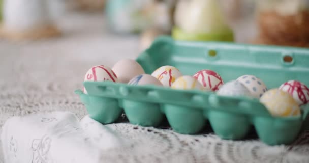 Easter Eggs in Extruder on Decorated Table - Footage, Video