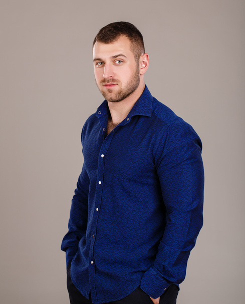 Portrait of a young business man in the blue shirt - Foto, Bild