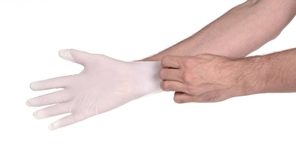 Latexhandschuh isoliert auf weißem Hintergrund - Medizinische Geräte, Schutzhandschuhe - Foto, Bild
