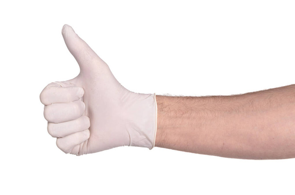 Guante de látex aislado sobre fondo blanco - Equipo médico, guantes de protección - Foto, imagen
