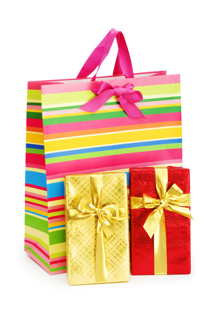 Bolsa de regalo a rayas aislada en el fondo blanco
 - Foto, imagen