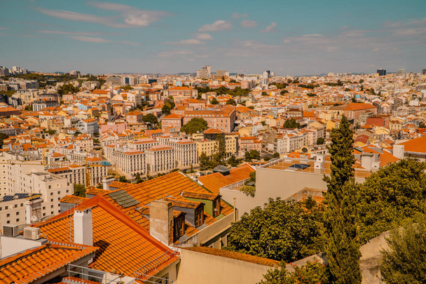 Lisbon, Portugal - September 21, 2020 - panoramic view from Castelo do Sao Jorge with central Lisbon skyline with and business district - Fotó, kép