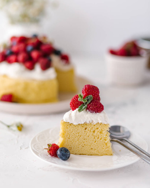 Japanese cheese cake with strawberry and berries ,food concept background, homemade, cream - Foto, immagini