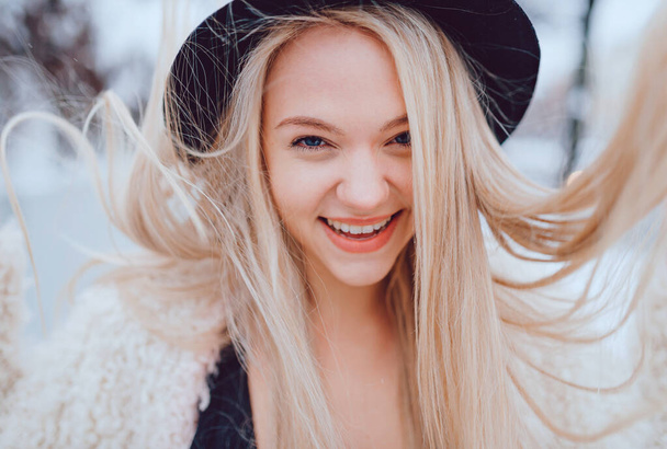 Portrait of funny stylish blonde girl with flying hair - Fotoğraf, Görsel