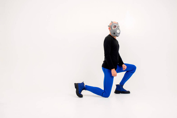 Funny strange man in respirator posing over white background - Foto, Imagem
