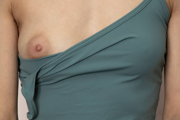 nude female small breasts closeup, erotica, naked girl - Zdjęcie, obraz