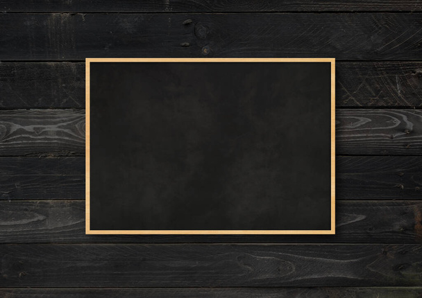 Traditional blackboard isolated on a black wood background. Blank horizontal mockup template - Fotografie, Obrázek