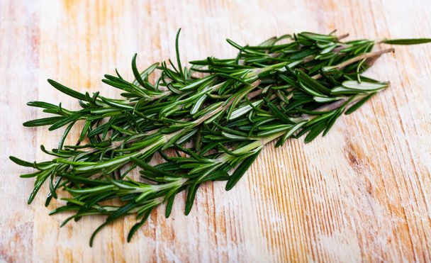 Image of rosemary on wooden background, nobody - Foto, immagini