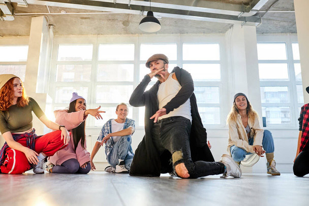 caucasian modern hip hop street artist break dancer dancing in the studio - Fotografie, Obrázek