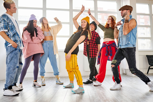positive youth training hip hop in dance studio, dance classes for teens - Фото, изображение