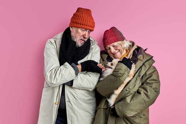 happy senior couple of homeless people with pet dog - Foto, Imagen