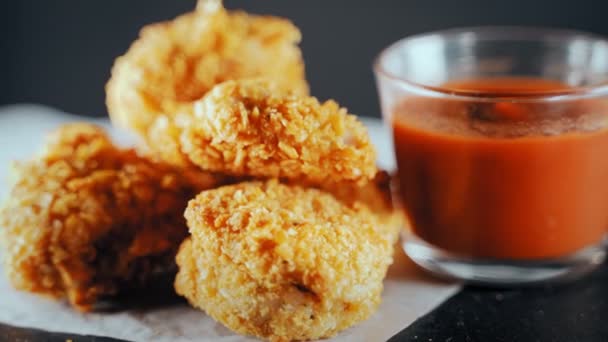 Fried crispy chicken nuggets with ketchup. - Footage, Video