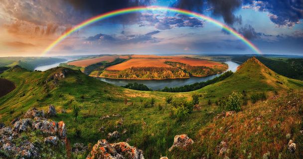 colorful rainbow over the river canyon. spring morning - Photo, Image