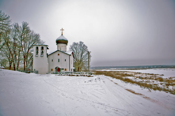 Church of Elijah the Prophet. Vybuty churchyard. Pskov region. Russia. Date of shooting December 23, 2018 - Zdjęcie, obraz