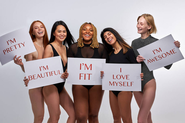 diverse cheerful models convey the idea that everyone should love their body - Fotó, kép
