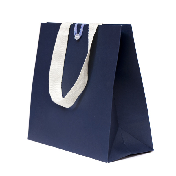 Blue shopping bag on white  - Фото, изображение