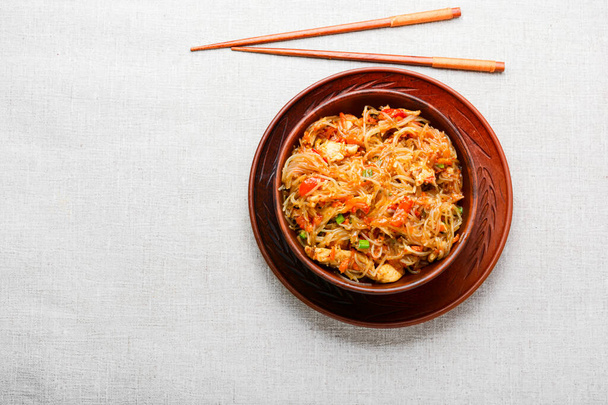 Funchoza, Chinese noodles with spices and chicken.Space for text - Фото, изображение