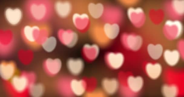 Día de San Valentín. Tema de amor para boda, aniversario y festival de San Valentín sobre fondo bucle sin costuras de amor rosa con texto de saludo. - Metraje, vídeo