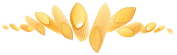 Italian pasta levitating on a white background - Photo, Image