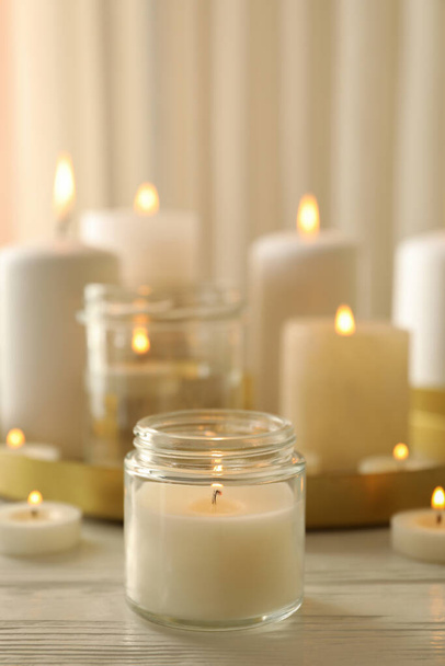 Burning scented candles for relax on white wooden table - Foto, Imagem