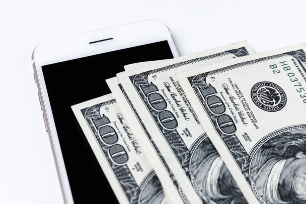 Smartphone and dollars. Mobile payment concept. - Φωτογραφία, εικόνα