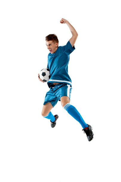 Funny emotions of professional soccer player isolated on white studio background, excitement in game - Foto, Bild