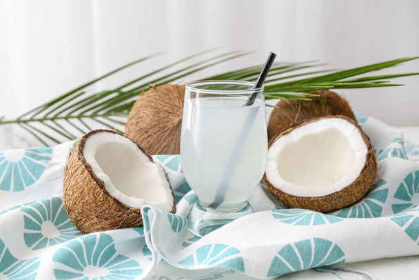 Composition with fresh coconut water on table - Photo, Image
