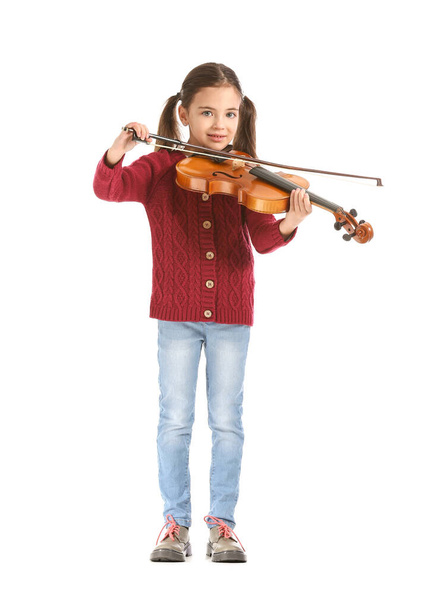 Little girl playing violin on white background - Photo, Image