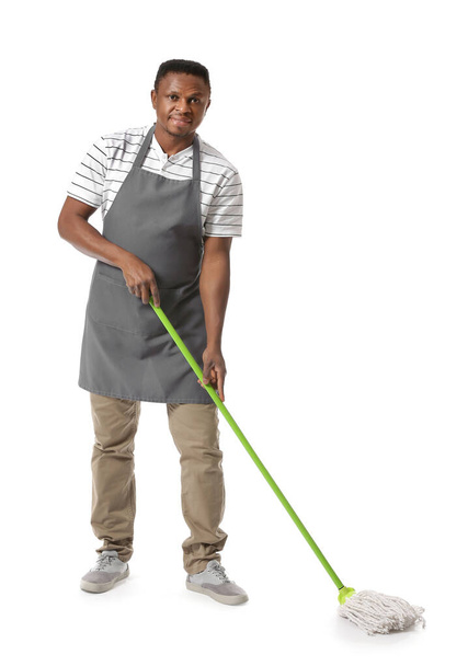 African-American man with mop on white background - Photo, Image