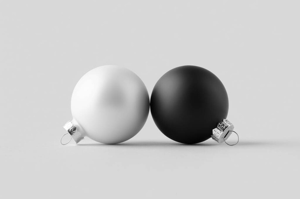 White and black matte Christmas balls mockup on a seamless grey background. - Fotoğraf, Görsel