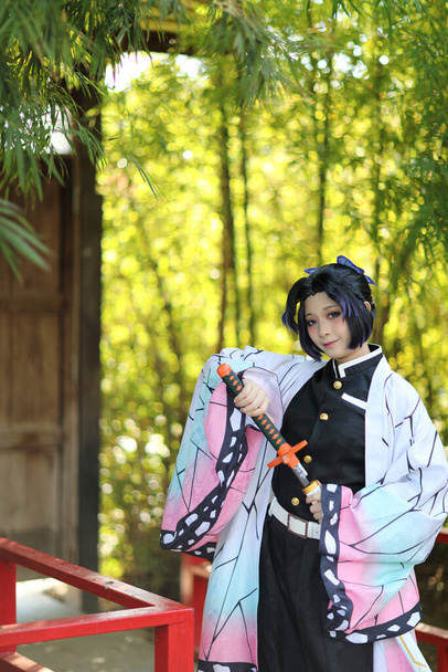 Japan anime cosplay portrait of girl with comic costume with japanese theme - Photo, Image