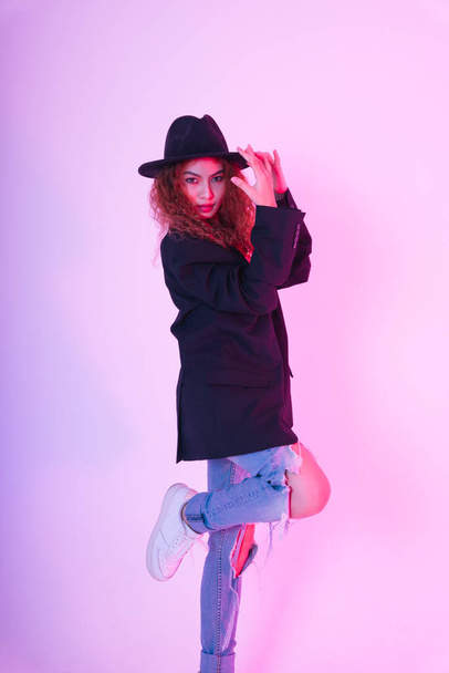 Fashion portrait of young asian curly hair woman wear black jacket and hat isolate on white background. - Photo, Image