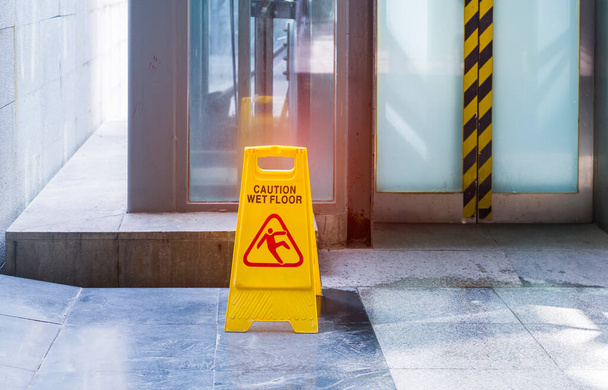 "Caution wet floor" sign in mall - Photo, Image