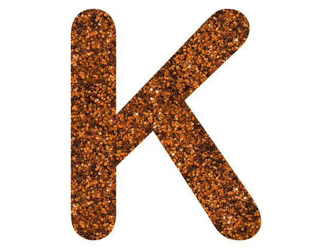 A glittery brown letter K on a white isolated background - Foto, afbeelding