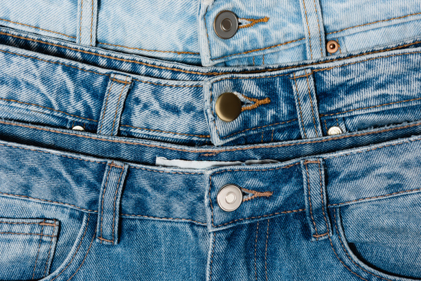 close up view of various blue jeans - Photo, Image