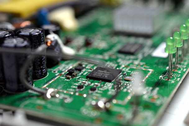 ,  - Jan 24, 2020: A closeup shot of a modem circuit board on a blurred background - Foto, immagini