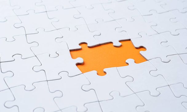 Empty white jigsaw puzzle with  missing pieces - Photo, Image