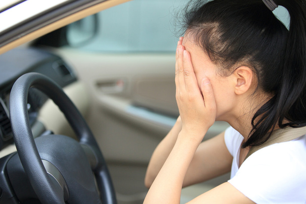 Sad woman driver in car - Fotoğraf, Görsel