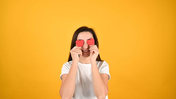 Blind female love concept, on yellow background. High quality photo - Fotoğraf, Görsel