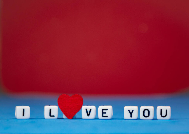 I love you on a colored background . Valentines Day. The concept of love and beauty - Photo, Image