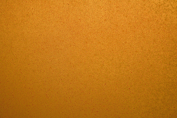 Abstraktní pozadí oranžové barvy. Prázdný, rovný povrch s jemnou texturou.  - Fotografie, Obrázek