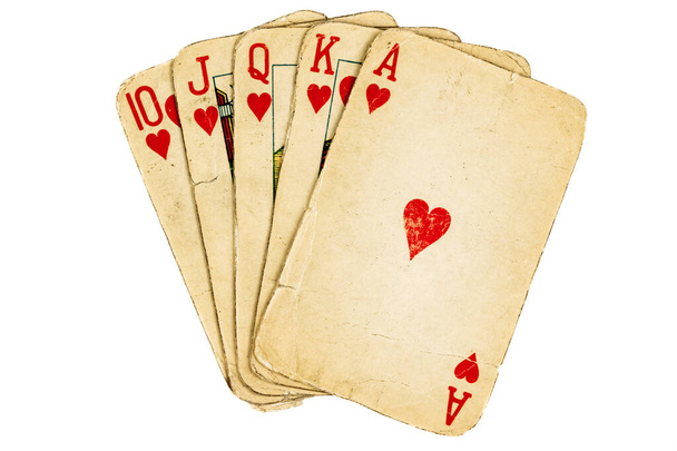 alte Spielkarten, Royal Flush auf weißem Hintergrund. - Foto, Bild