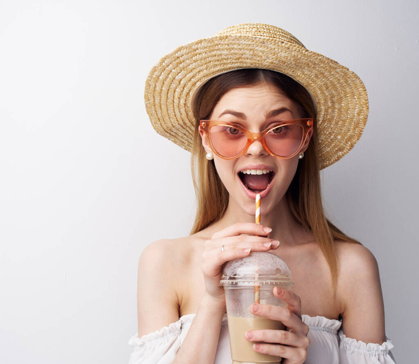 Pretty emotional woman in glass hat with pink glasses luxury Studio drink - Photo, Image