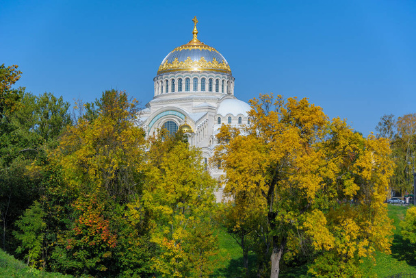 Autumn view to Naval cathedral of Saint Nicholas from Petrovsky dock basin in Kronstadt at the island Kotlin near the Saint-Petersburg, Russia. - Photo, Image