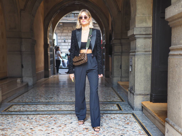 Fashion blogger street style outfit before Vivetta fashion show during Milan fashion week Spring/Summer 2020 - Foto, Imagen